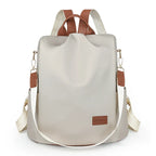 Sac femme blanc en nylon à main et à dos