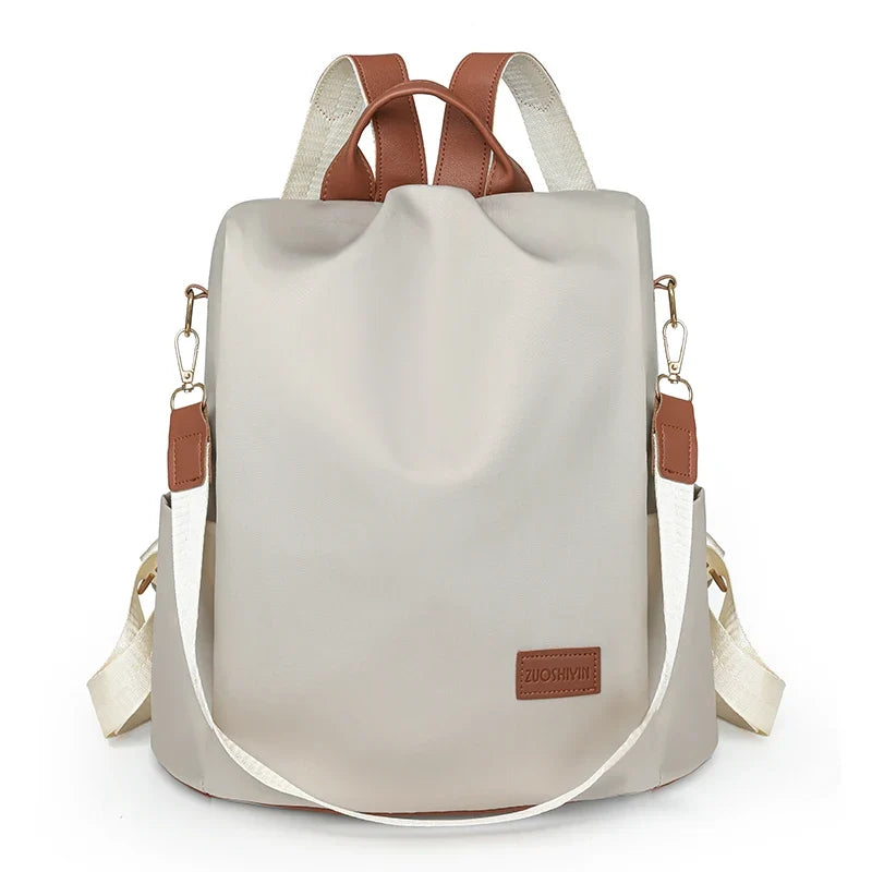 Sac femme blanc en nylon à main et à dos