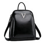 Sac femme en cuir à main et dos