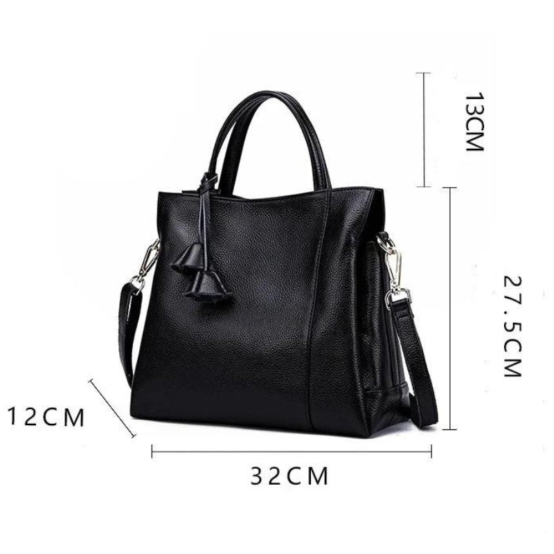 Sac femme en cuir porté en bandoulière