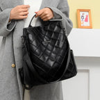 Sac femme en simili noir capitonné à porter main ou dos