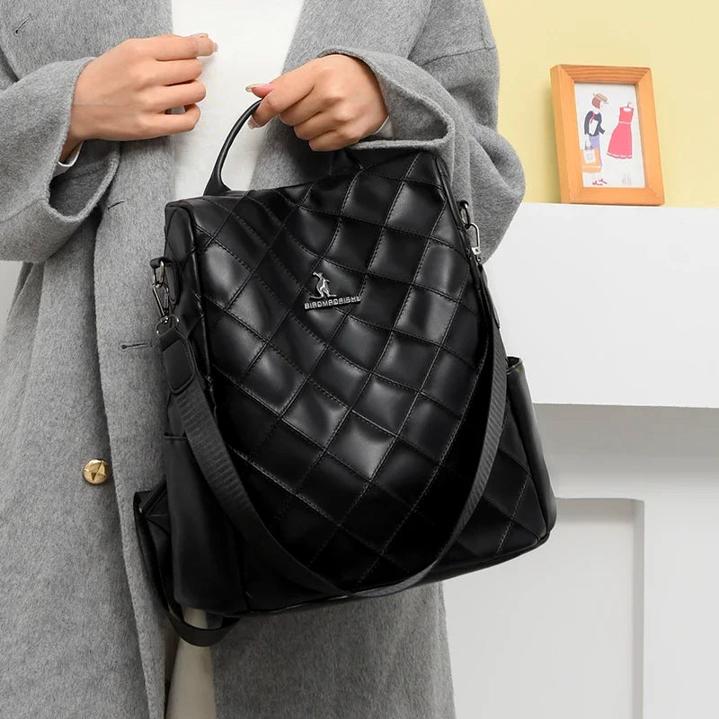 Sac femme en simili noir capitonné à porter main ou dos