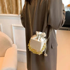 Sac femme façon bourse luxueuse doté d’une chaîne