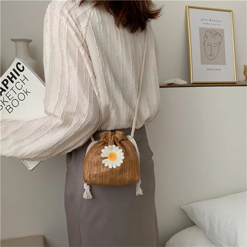Sac femme façon bourse orné d’une pâquerette