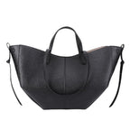 Sac femme porté à la main pour les cours