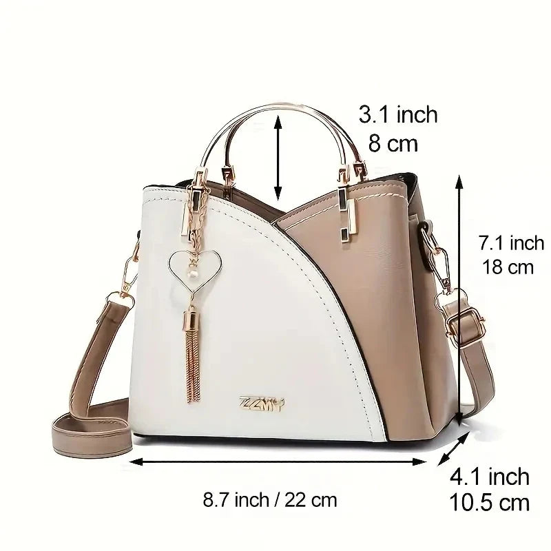 Sac femme tendance porté à la main