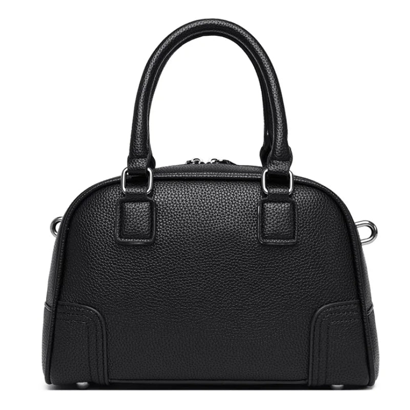 Sac forme bowling à porter à la main