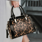Sac léopard à main avec texture crocodile