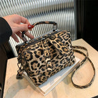 Sac léopard contemporain à porter en bandoulière