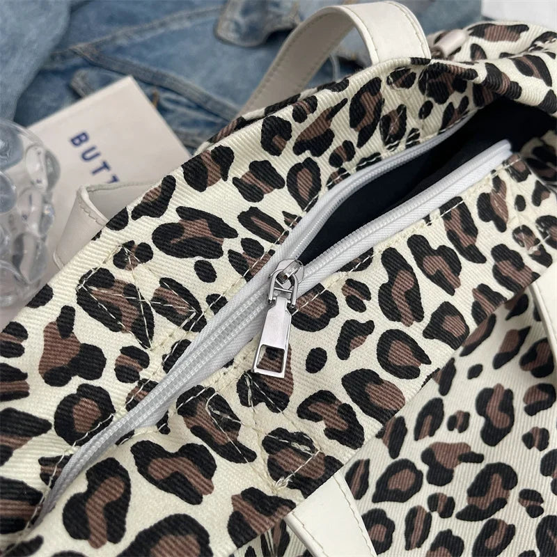Sac léopard flexible porté en bandoulière