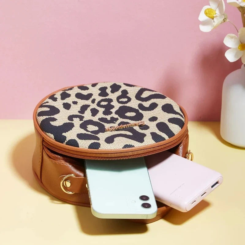 Sac léopard rond avec sangle bandoulière