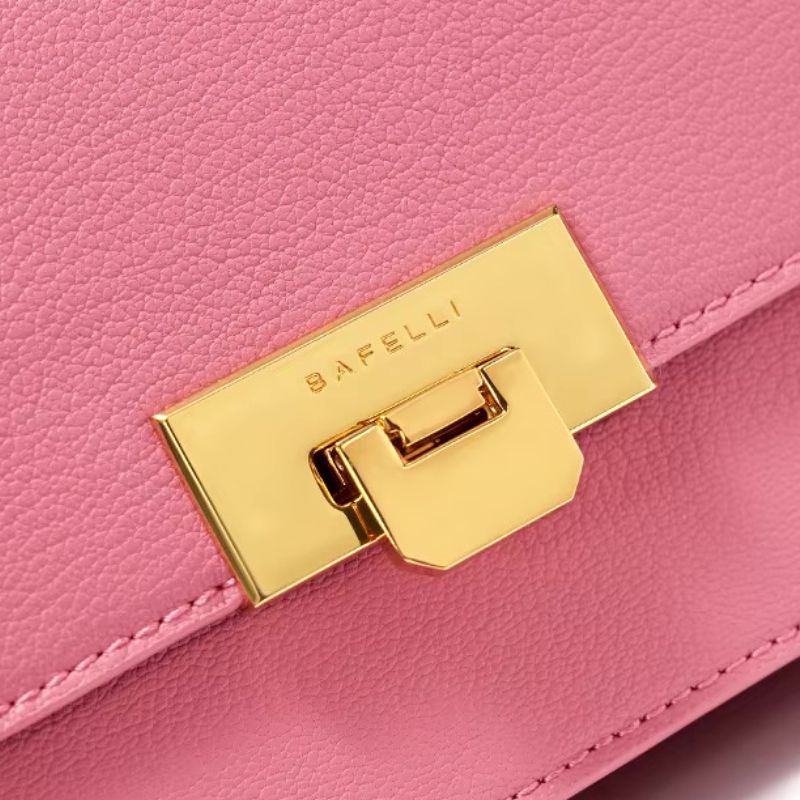 Sac luxueux pour femme en cuir rose porté main