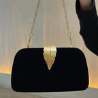 Sac luxueux pour mariage orné d’une feuille dorée