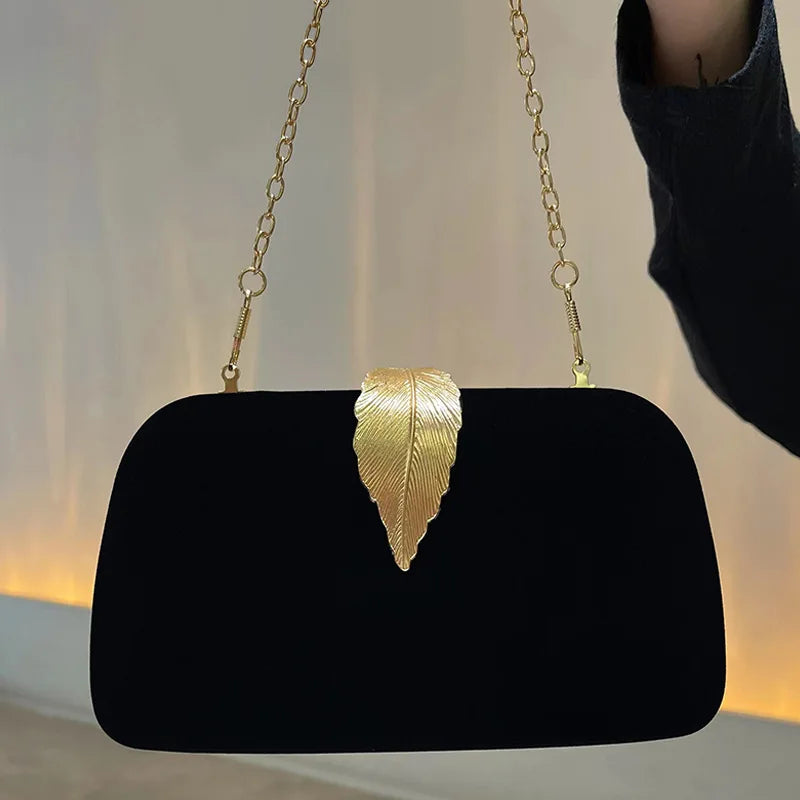 Sac luxueux pour mariage orné d’une feuille dorée