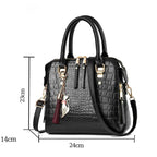 Sac luxueux style crocodile doté d’une bandoulière