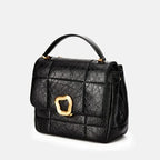 Sac mallette noir à finition matelassée