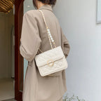 Sac matelassé à main avec perles