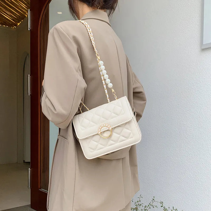 Sac matelassé à main avec perles