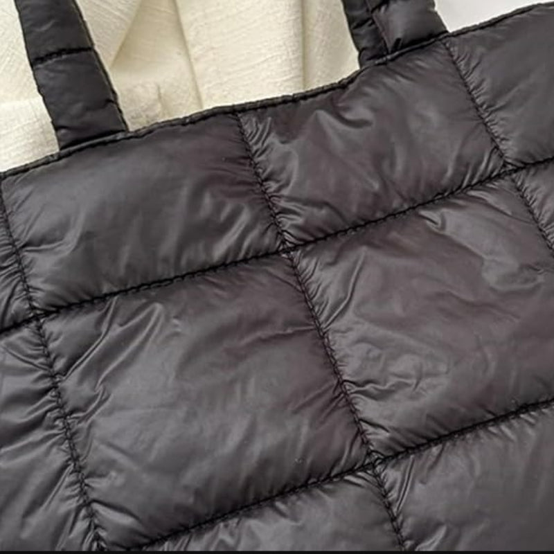 Sac matelassé à main destiné aux femmes