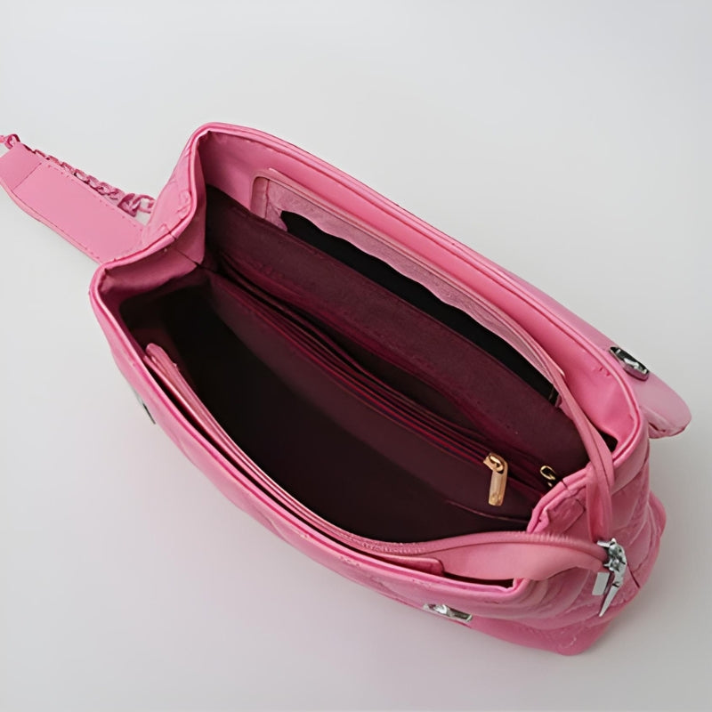 Sac matelassé avec chaîne pour port à la main
