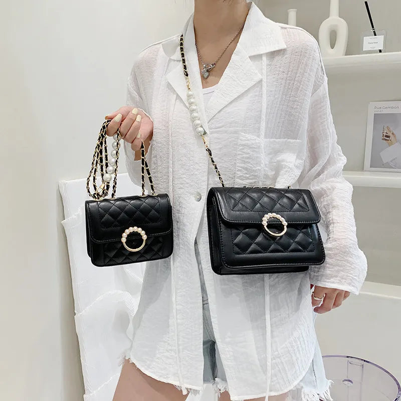 Sac matelassé avec perles à porter à la main
