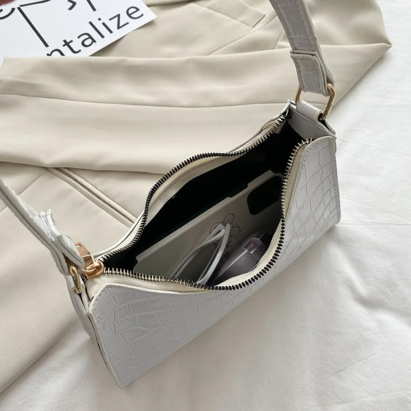 Sac matelassé luxueux de forme baguette