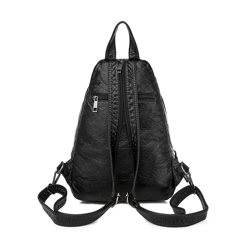 Sac noir compact femme, à dos et à main