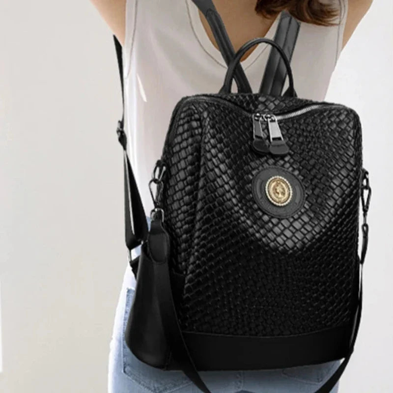Sac noir élégant et raffiné pour femme à main et dos