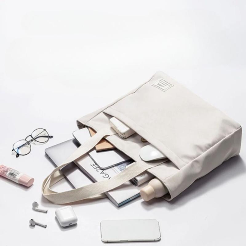 Sac ordinateur féminin blanc confectionné en toile