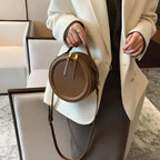 Sac original rond porté à la main