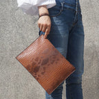Sac pochette soirée effet serpent