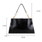Sac porté à l'épaule et en bandoulière