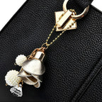 Sac pour femme décoré d'une breloque