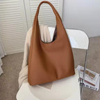 Sac pour femme porté épaule au style contemporain