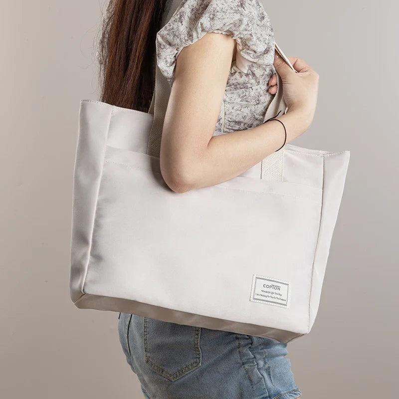 Sac pour ordinateur femme en toile blanche