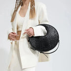 Sac rond à l'effet crocodile