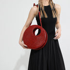 Sac rond au fini effet crocodile