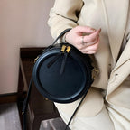 Sac rond au style original porté à main