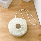 Sac rond en paille avec motif de fleur