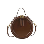 Sac rond original conçu pour être porté à main