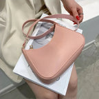 Sac rose en simili de forme baguette rétro