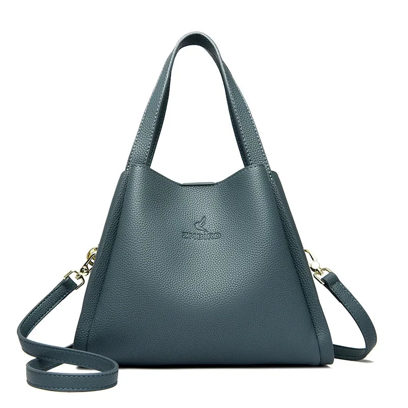 Sac seau chic au design souple, porté main