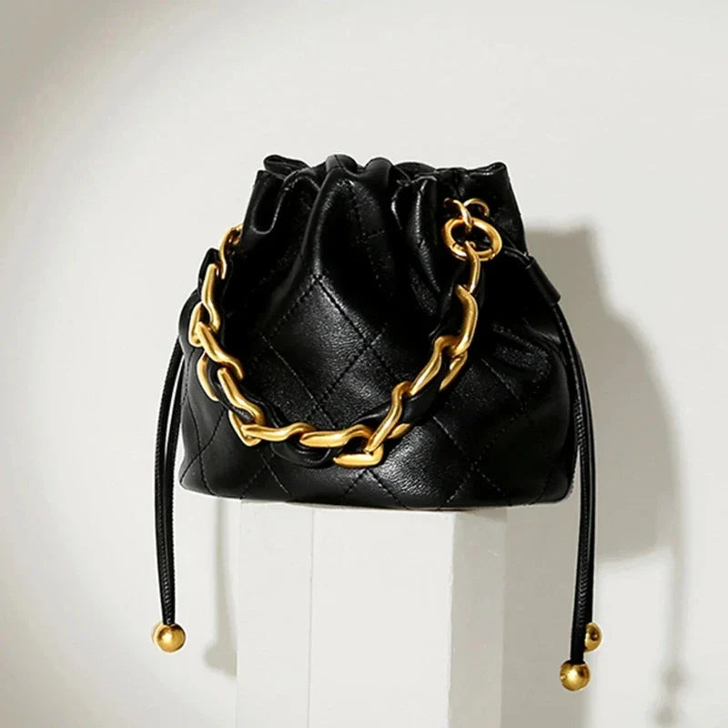 Sac style bourse noir et matelassé