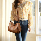 Sac vintage à main avec plusieurs poches