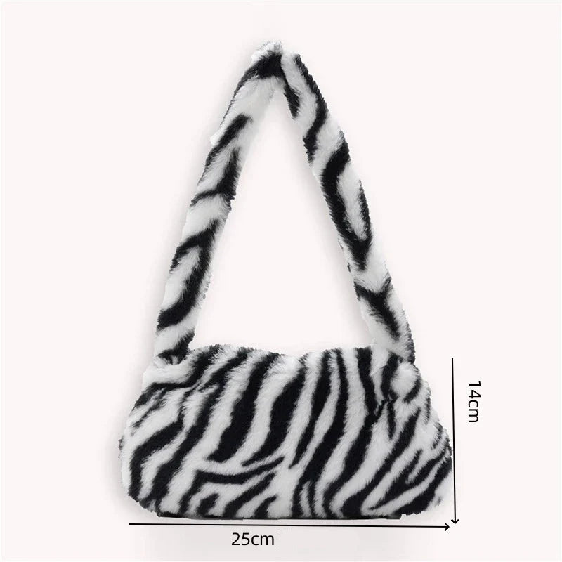 Sac zébré à main en fourrure synthétique